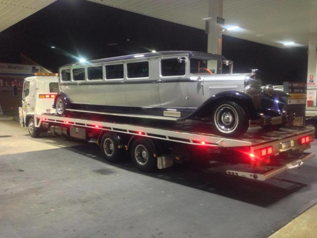 stretch classic car limo on a tilt tray truck in WA