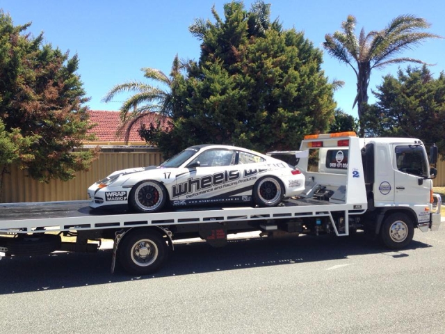 Race day track car transported by a tilt tray in Western Australia